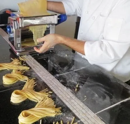 Fresh pasta being made by hand